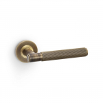 Spitfire Lever on Round Rose Reeded Style Antique Brass