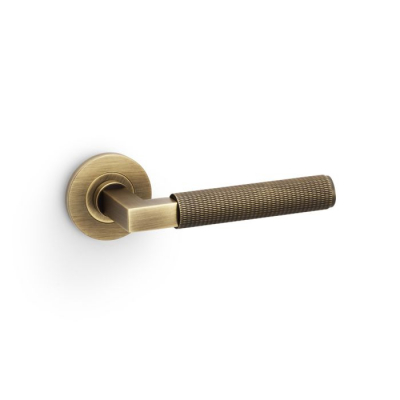 Hurricane Lever on Round Rose Knurled Style Antique Brass